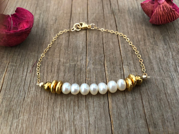 White pearl gold chain bracelet