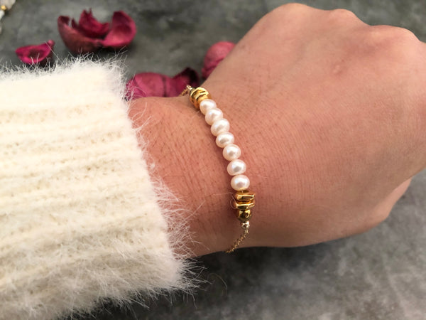 White pearl gold chain bracelet