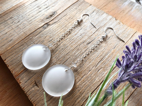 White glass coin earrings