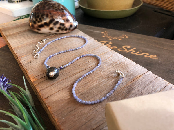 Purple tanzanite necklace with baroque vintage pearl